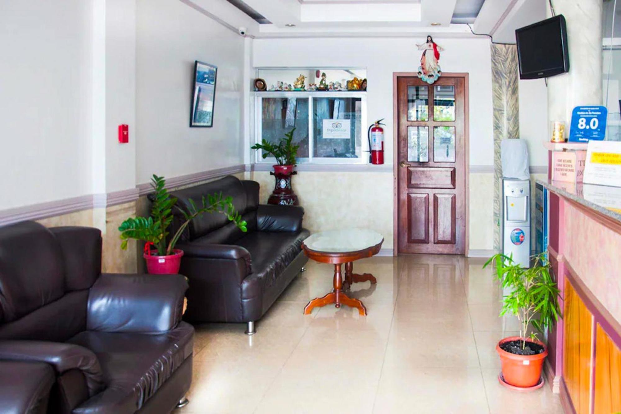 Mbg Travellers Inn Powered By Cocotel Puerto Princesa Exterior foto