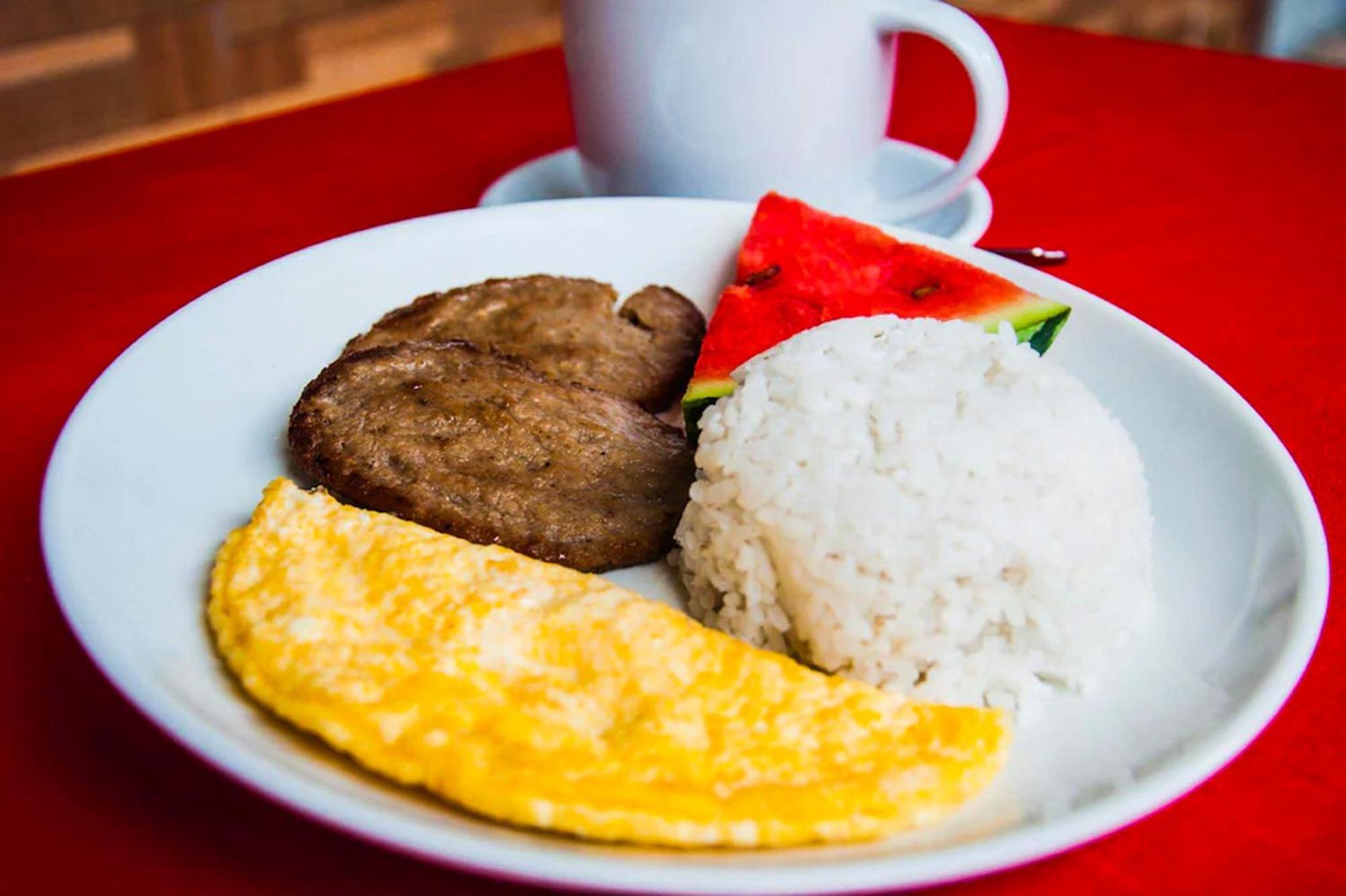 Mbg Travellers Inn Powered By Cocotel Puerto Princesa Exterior foto