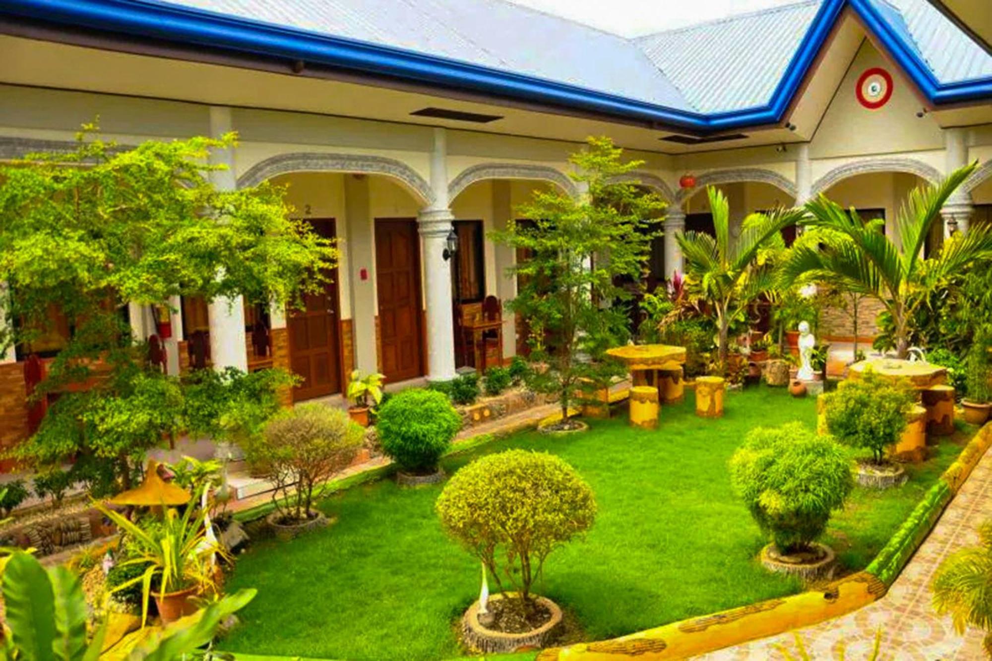 Mbg Travellers Inn Powered By Cocotel Puerto Princesa Exterior foto
